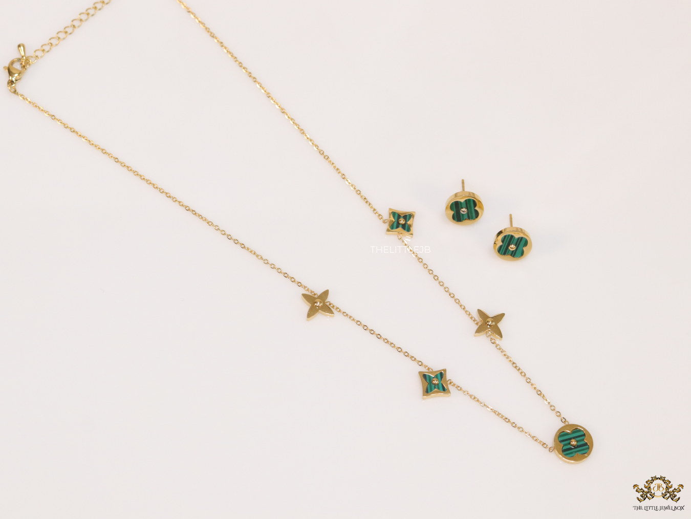 Clover necklace set in green malachite and gold plating