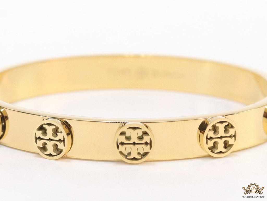 Gold plated bracelet with twin T motifs