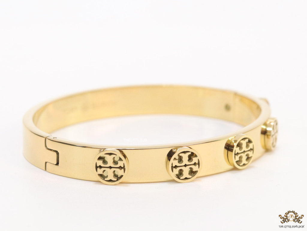 Gold plated bracelet with twin T motifs