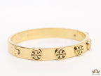 Gold plated bracelet with twin T motifs