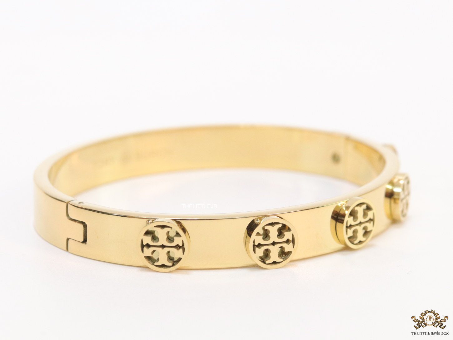 Gold plated bracelet with twin T motifs