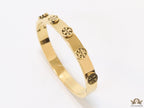 Gold plated bracelet with twin T motifs