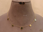 Clover necklace set in black enamel and gold plating