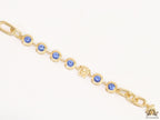 Designer golden Medusa chain bracelet with fancy cut cz