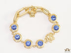 Designer golden Medusa chain bracelet with fancy cut cz