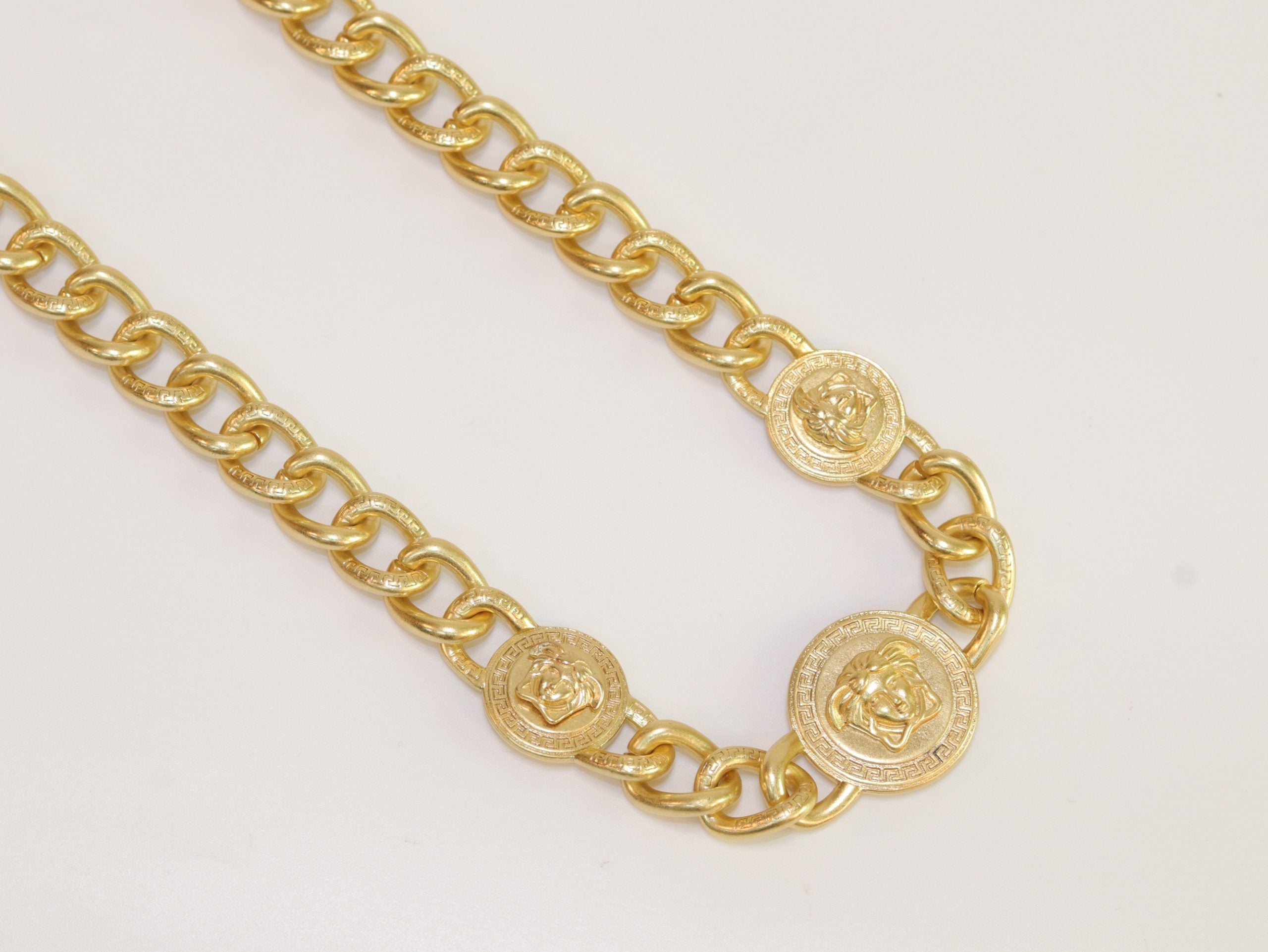 Chunky medusa gold link chain