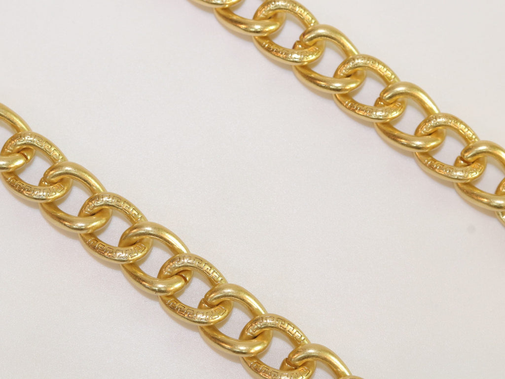 Chunky medusa gold link chain