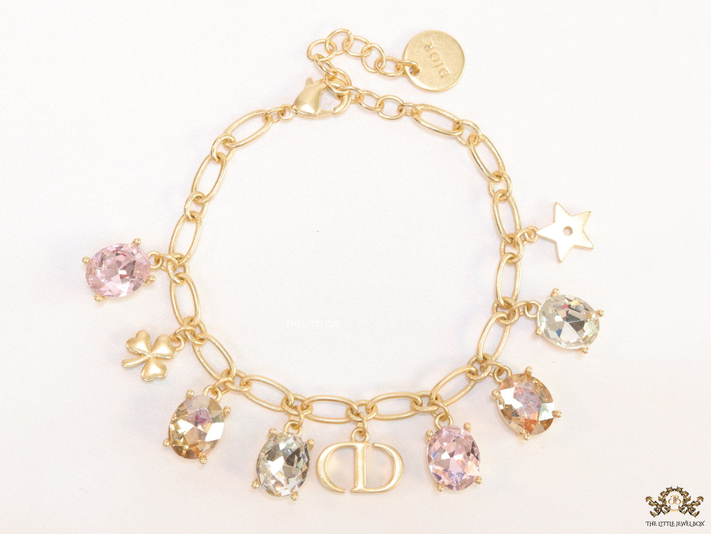 Golden chain bracelet with alphabet and cz charms