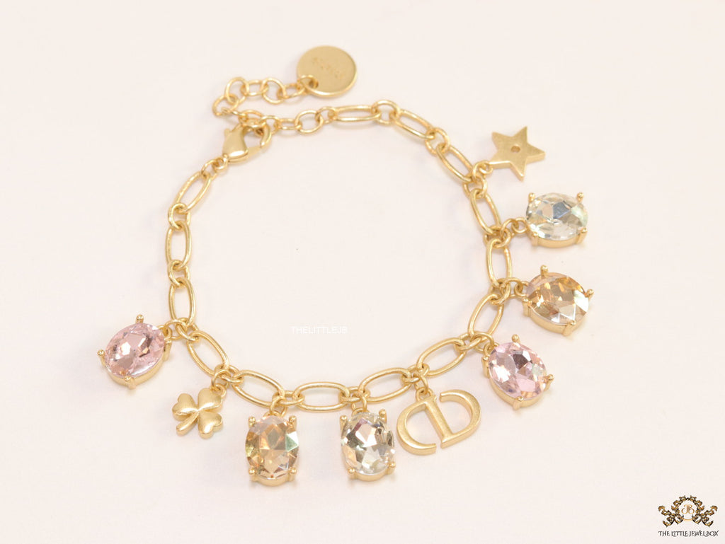 Golden chain bracelet with alphabet and cz charms