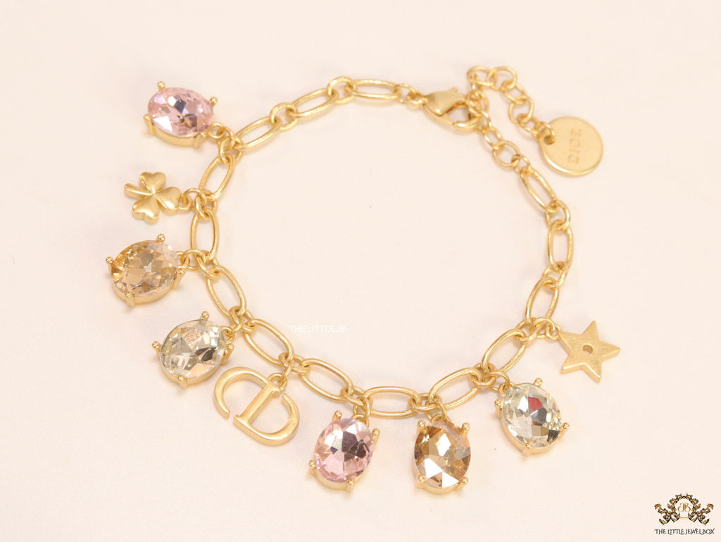 Golden chain bracelet with alphabet and cz charms