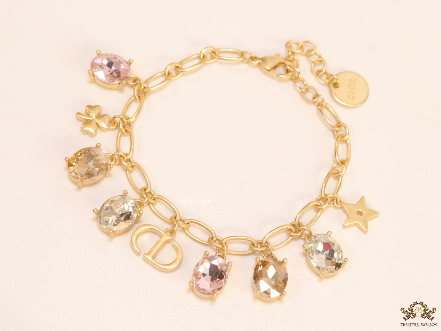 Golden chain bracelet with alphabet and cz charms