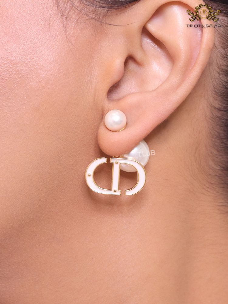 Pearl and baby pink enamel CD bombers