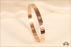Women's Rose Gold Plated bracelet with screws and zircons