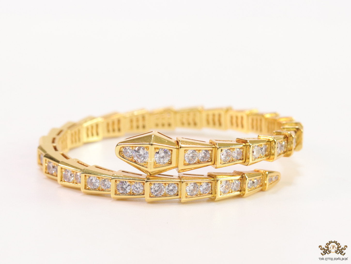 Gold plated open cz serpent bracelet