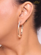 Alphabet T & Co. dual tone rose gold and cz oval hoops