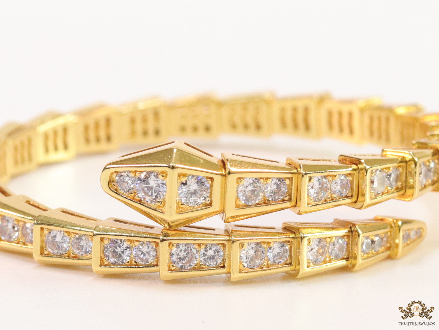 Gold plated open cz serpent bracelet