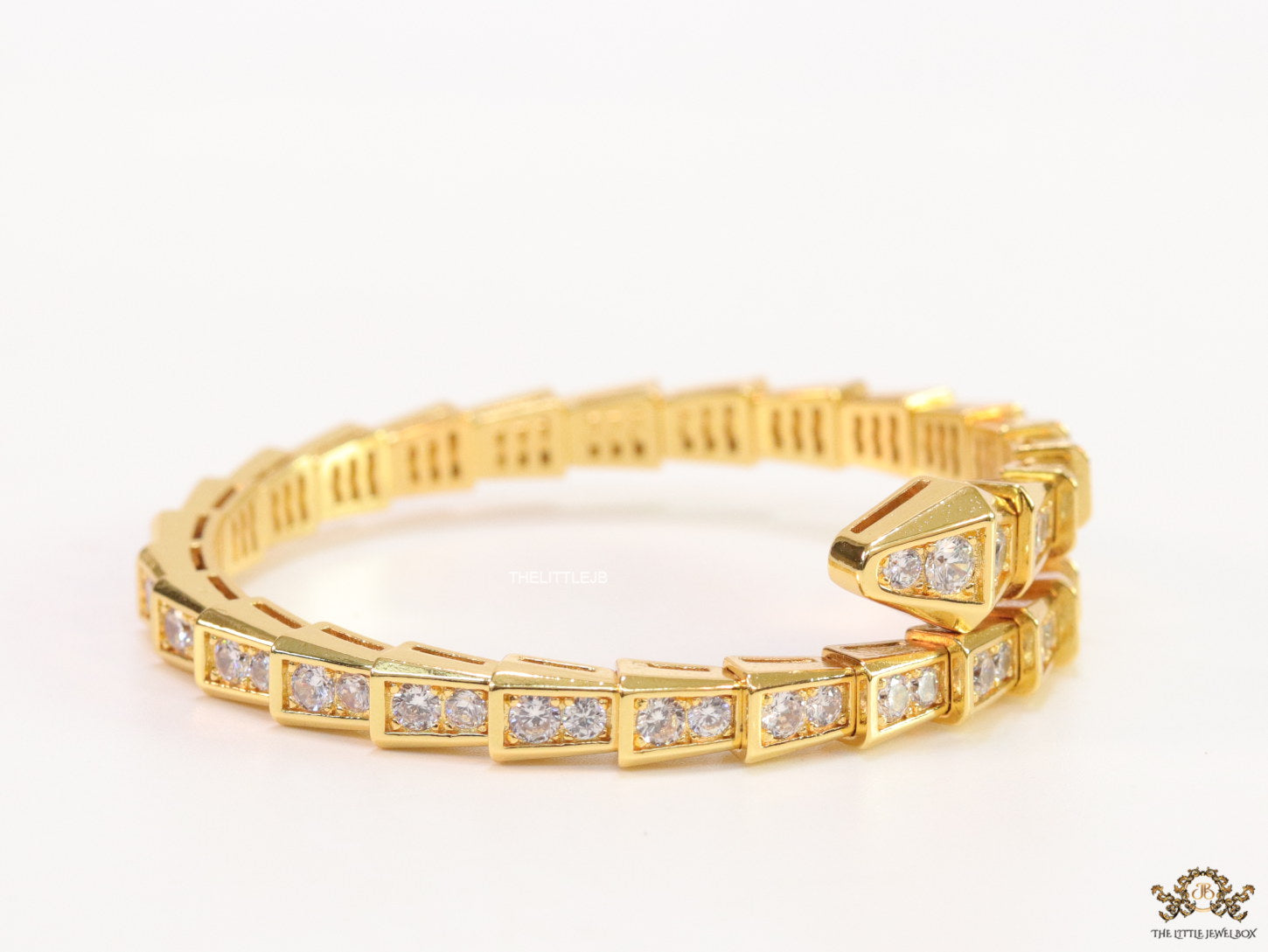 Gold plated open cz serpent bracelet