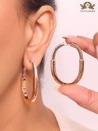 Alphabet T & Co. dual tone rose gold and cz oval hoops