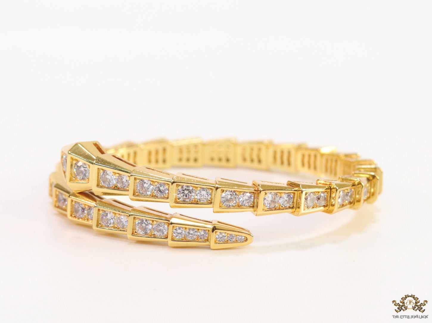 Gold plated open cz serpent bracelet