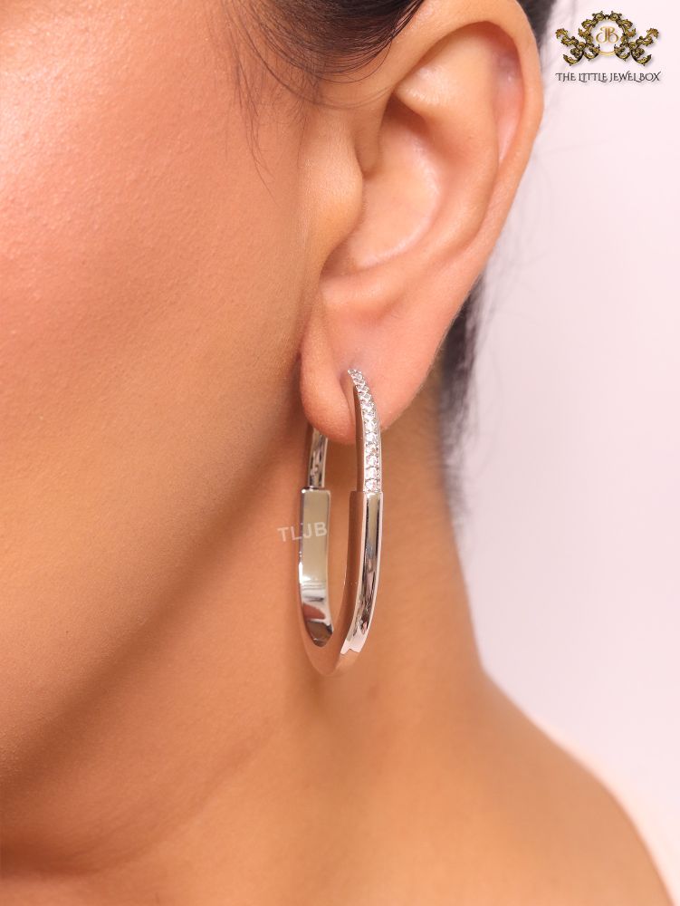 Alphabet T & Co. platinum and cz oval hoops