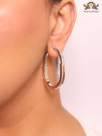 Alphabet T & Co. platinum and cz oval hoops
