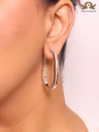 Alphabet T & Co. platinum and cz oval hoops