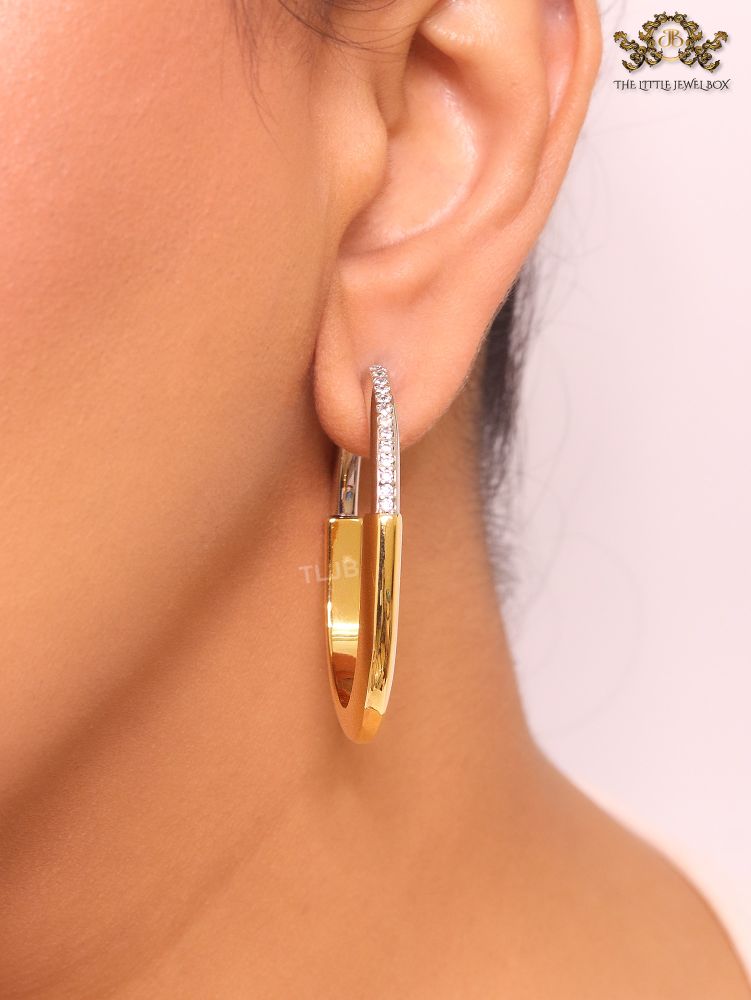 Alphabet T & Co. dual tone gold and cz oval hoops