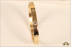 Women's Gold Plated bracelet with screws and zircons