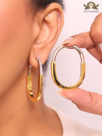 Alphabet T & Co. dual tone gold and cz oval hoops