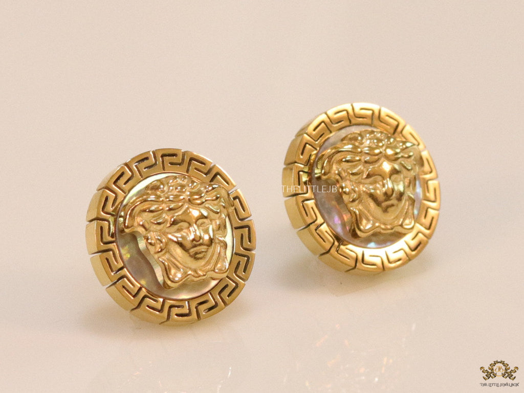 Gold plated Medusa studs in white enamel coating