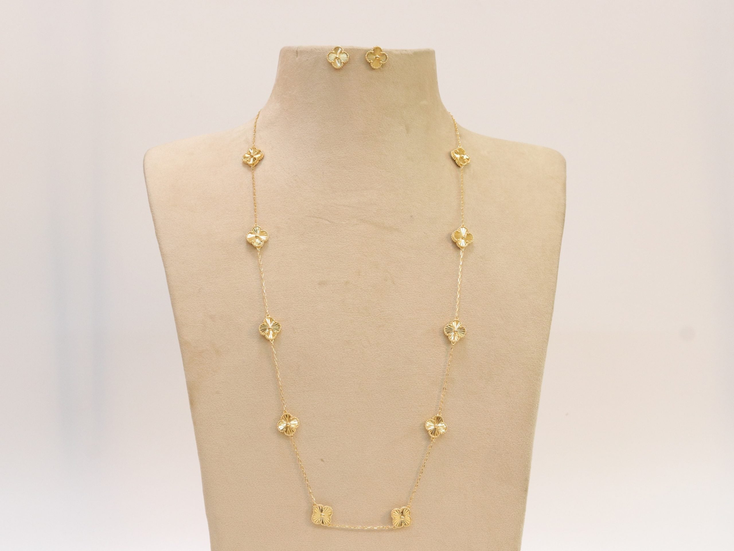 Gold clover necklace and earrings set