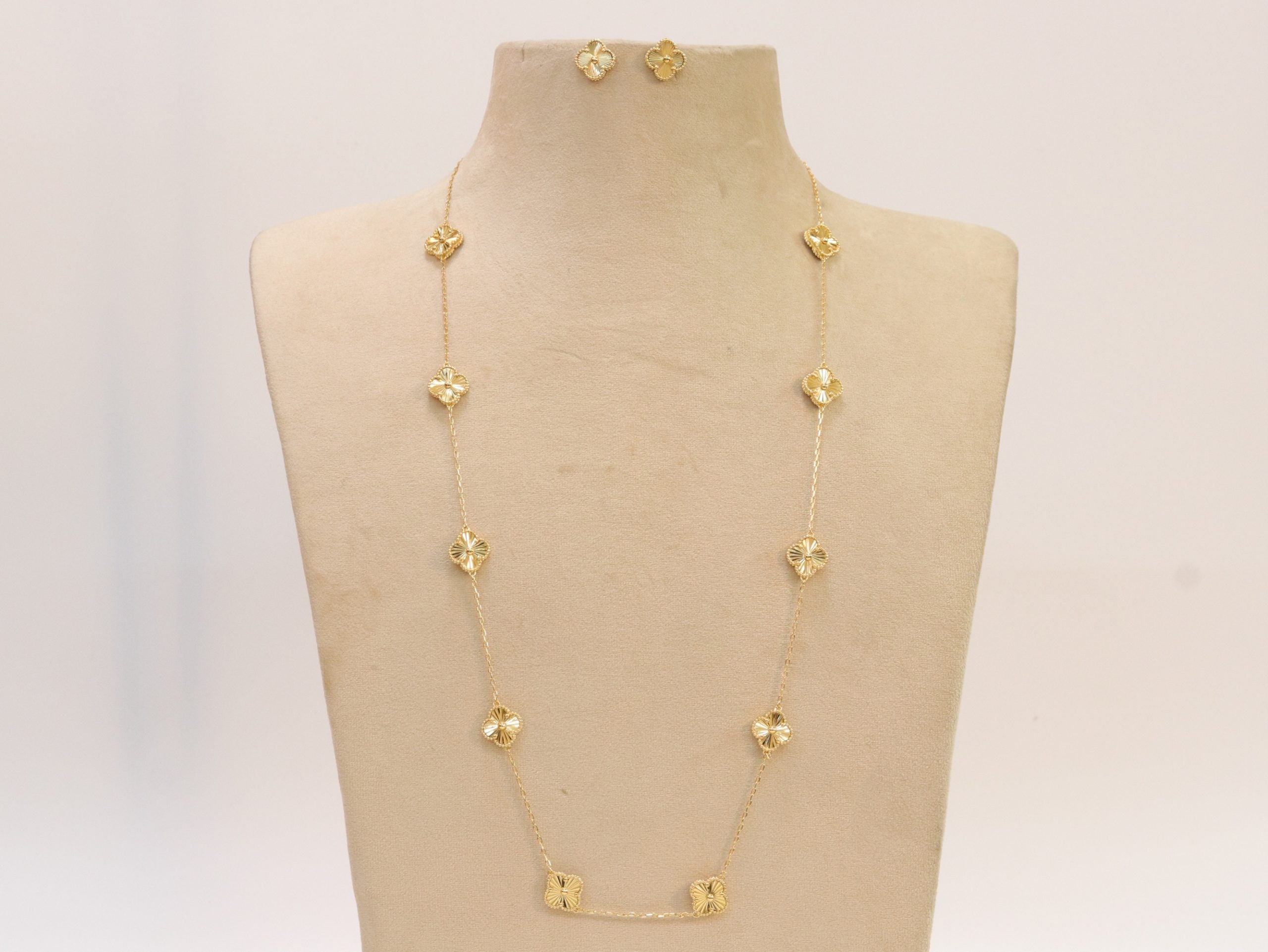 Gold clover necklace and earrings set