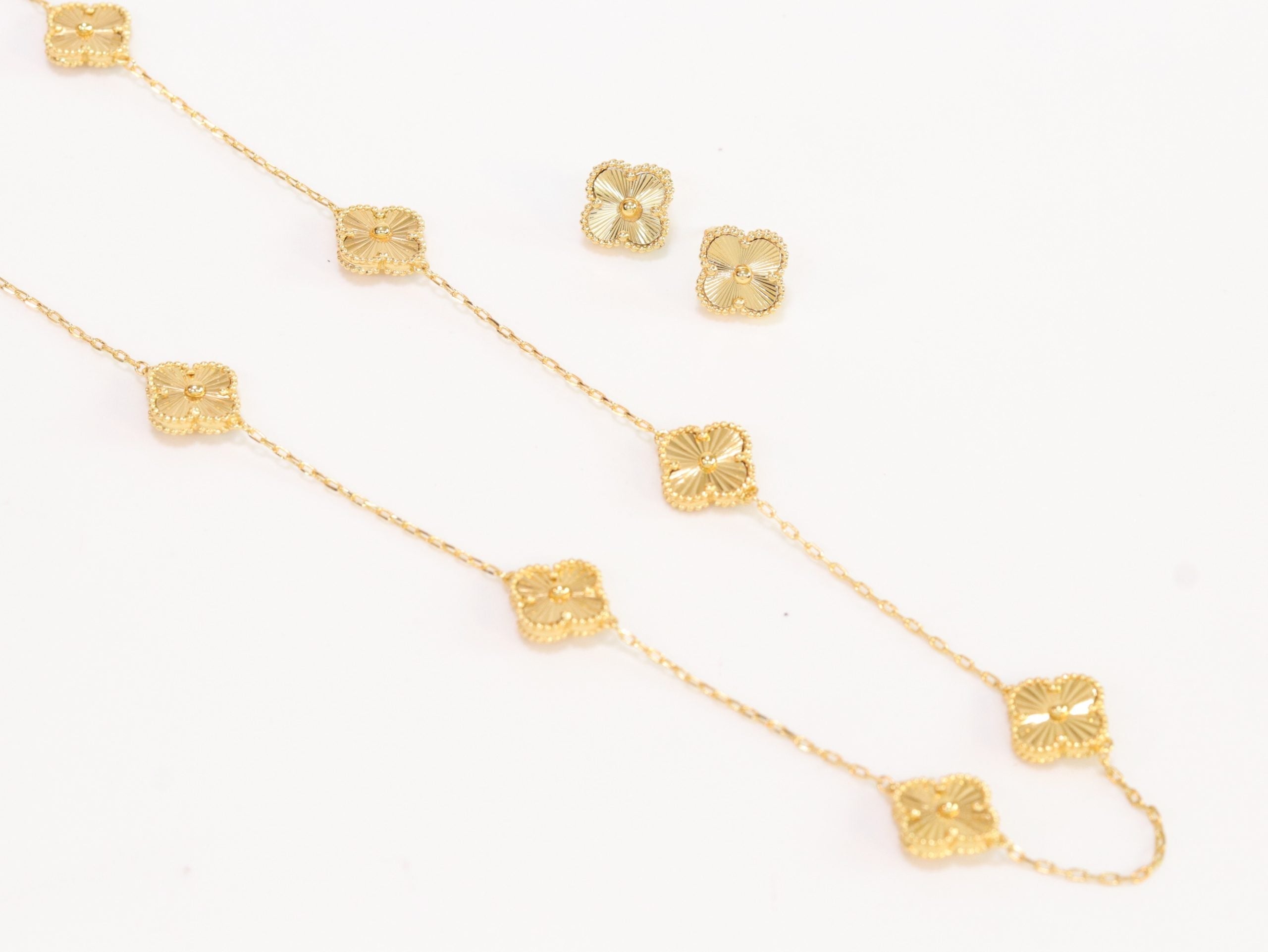 Gold clover necklace and earrings set