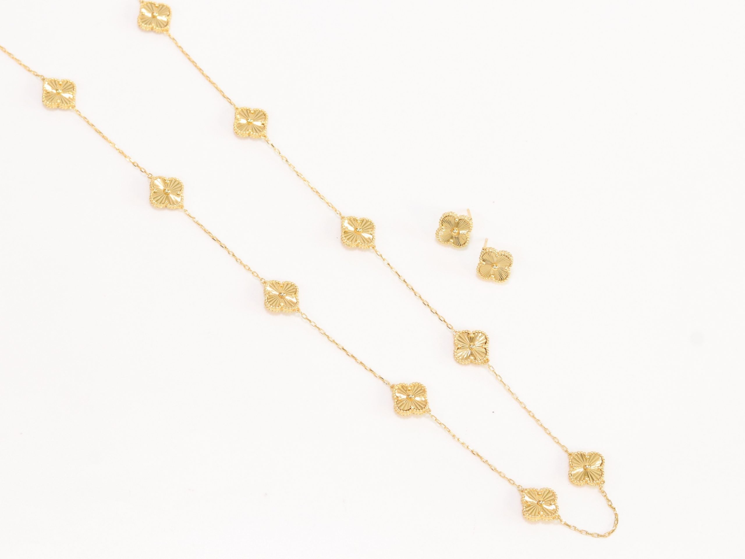 Gold clover necklace and earrings set