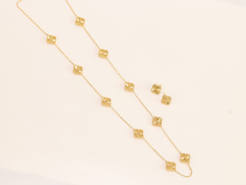 Gold clover necklace and earrings set