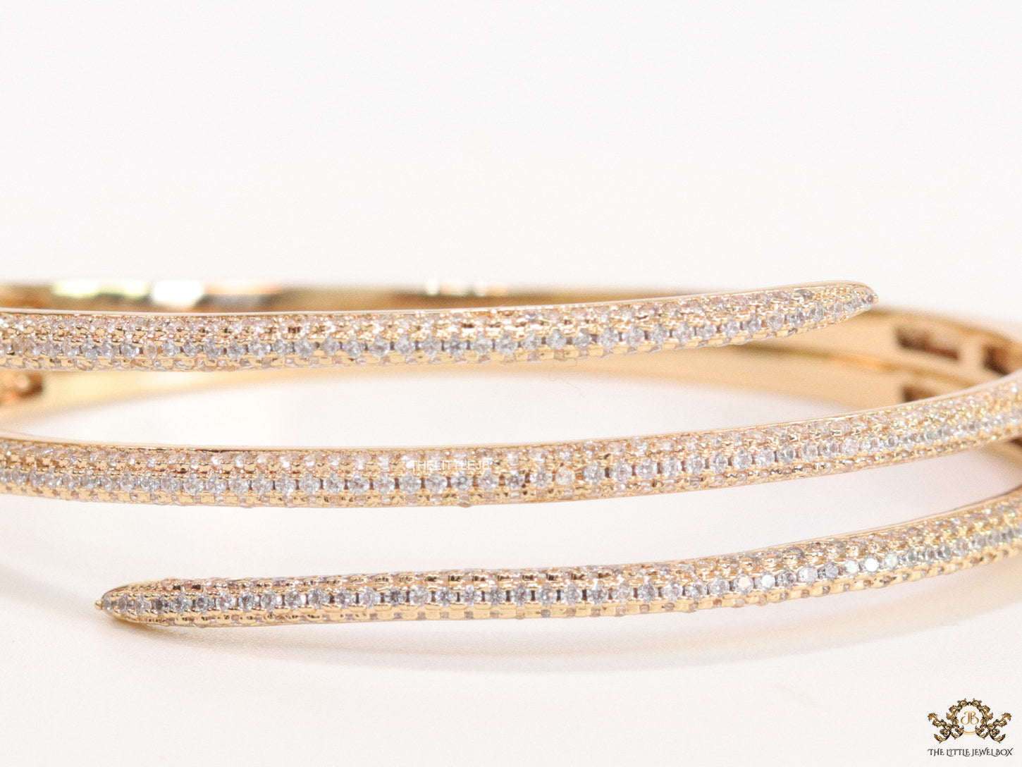 Triple line cz nail bracelet in gold plating