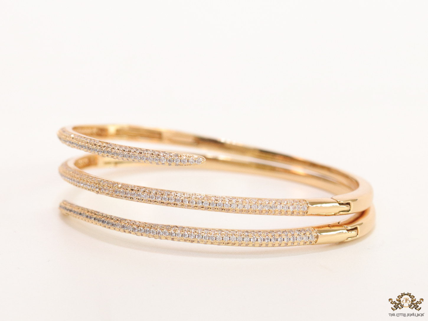 Triple line cz nail bracelet in gold plating