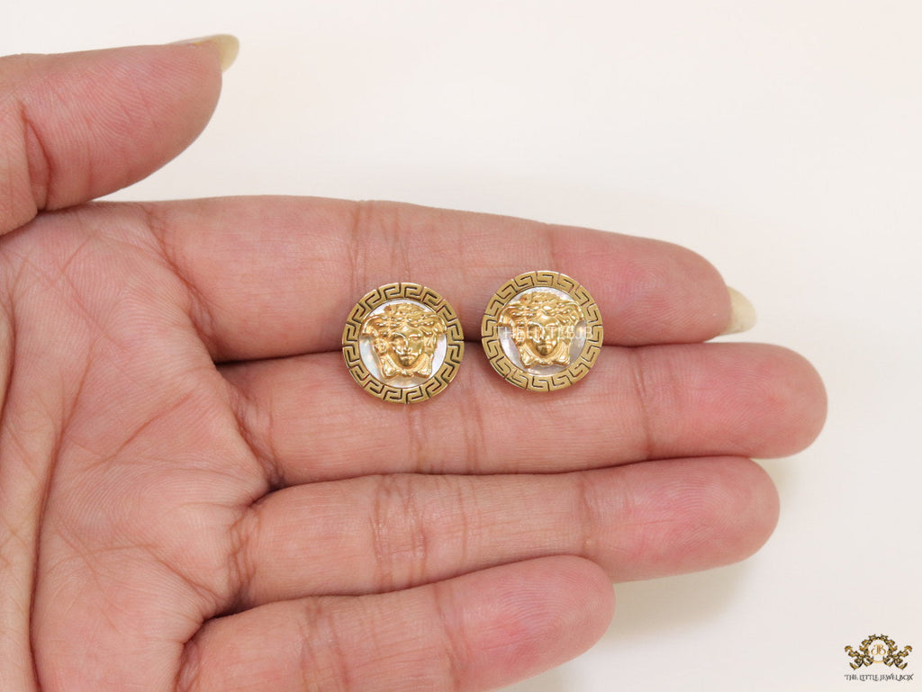 Gold plated Medusa studs in white enamel coating