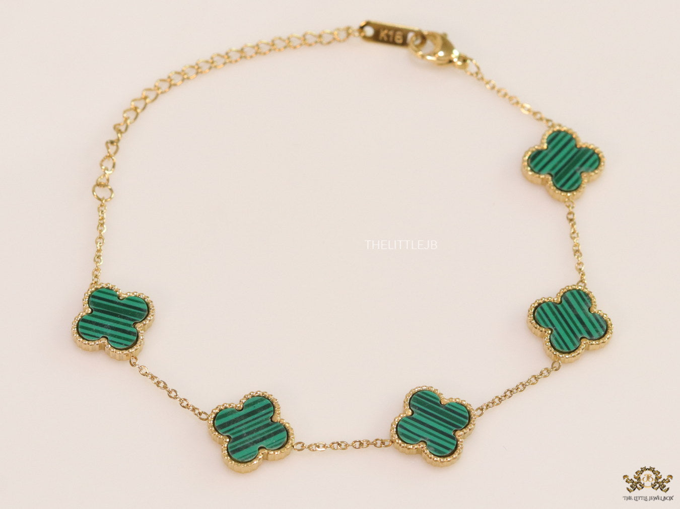 Openable chain bracelet with green malachite clovers