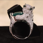 Adjustable panther ring with green emerald stone