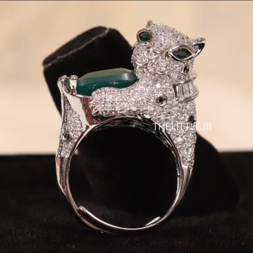 Adjustable panther ring with green emerald stone