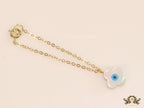 Clover leaf shaped mother of pearl watch charm with evil eye and gold plated chain
