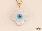 Clover leaf shaped mother of pearl watch charm with evil eye and gold plated chain