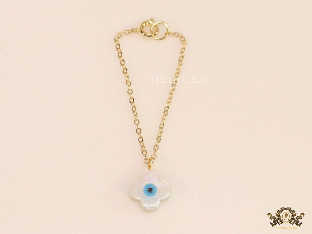 Clover leaf shaped mother of pearl watch charm with evil eye and gold plated chain