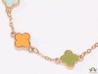 Golden chain bracelet with multi colored clovers