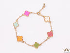 Golden chain bracelet with multi colored clovers