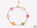 Golden chain bracelet with multi colored clovers