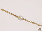 Golden link chain bracelet with Medusa motif centre