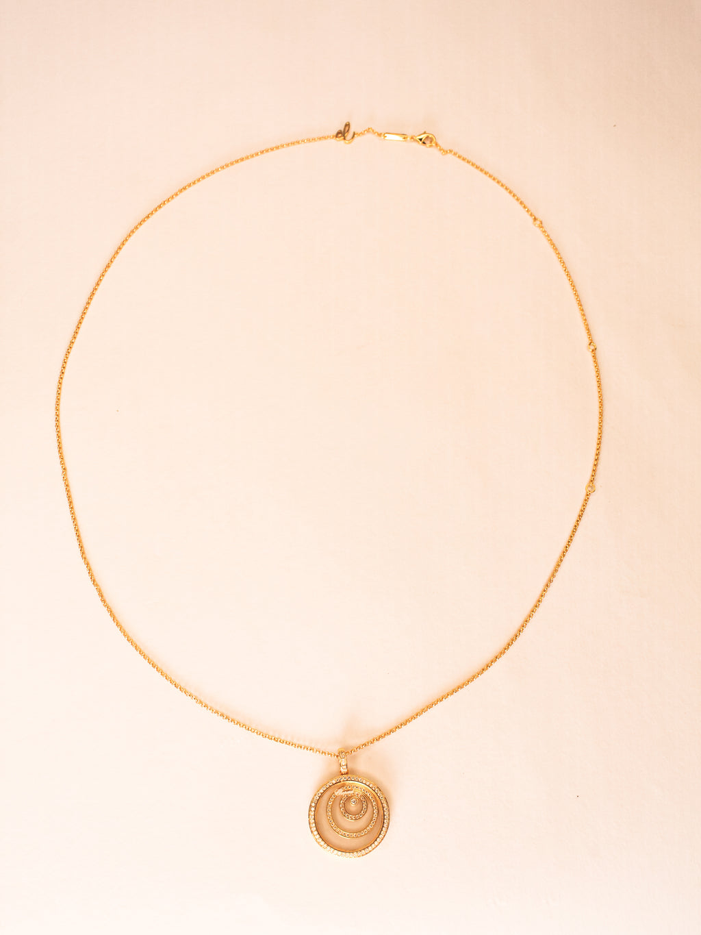gold swirl necklace CHPRD