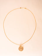 gold swirl necklace CHPRD